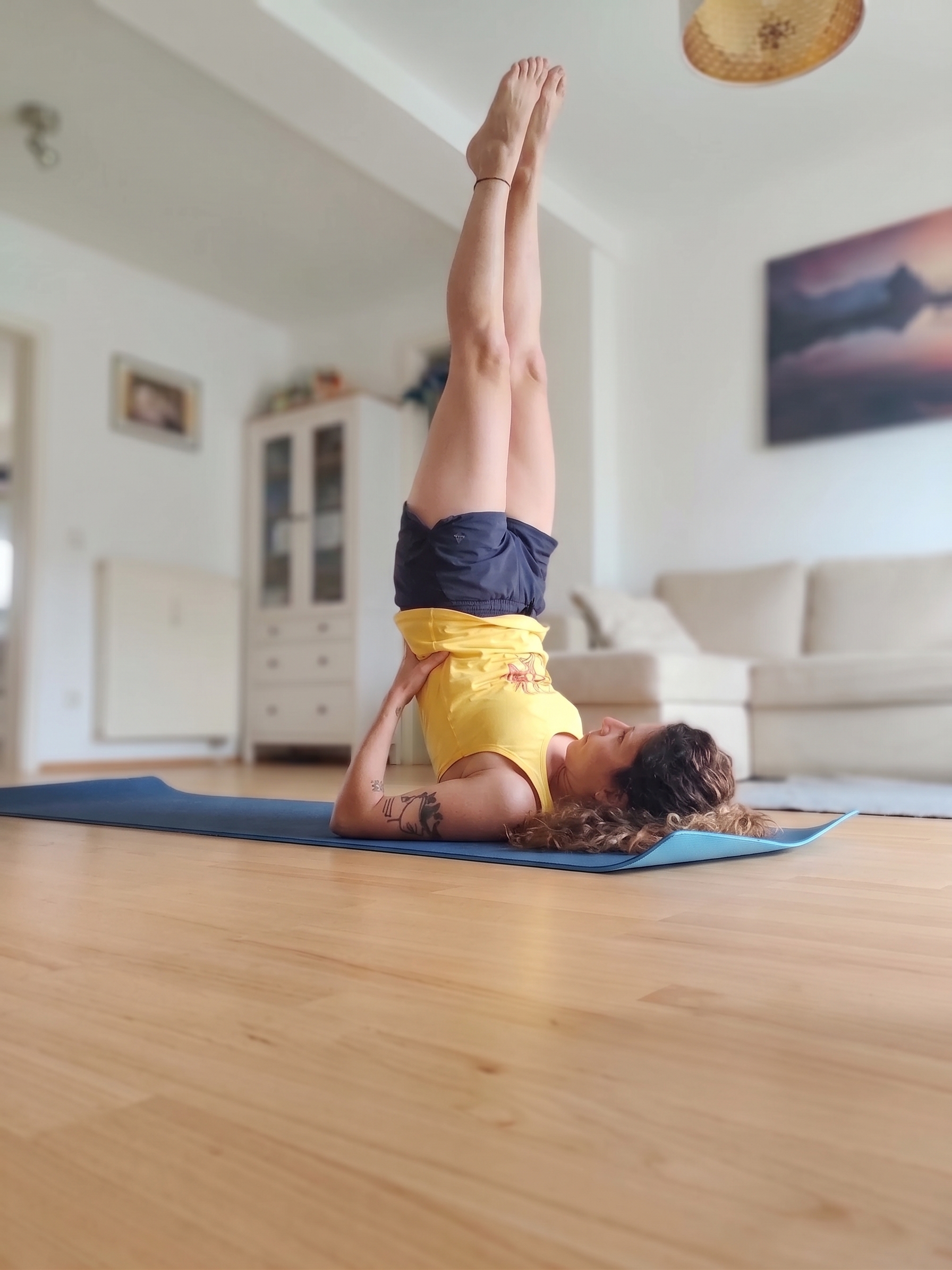 Ritika Arora in a yoga shoulder stand